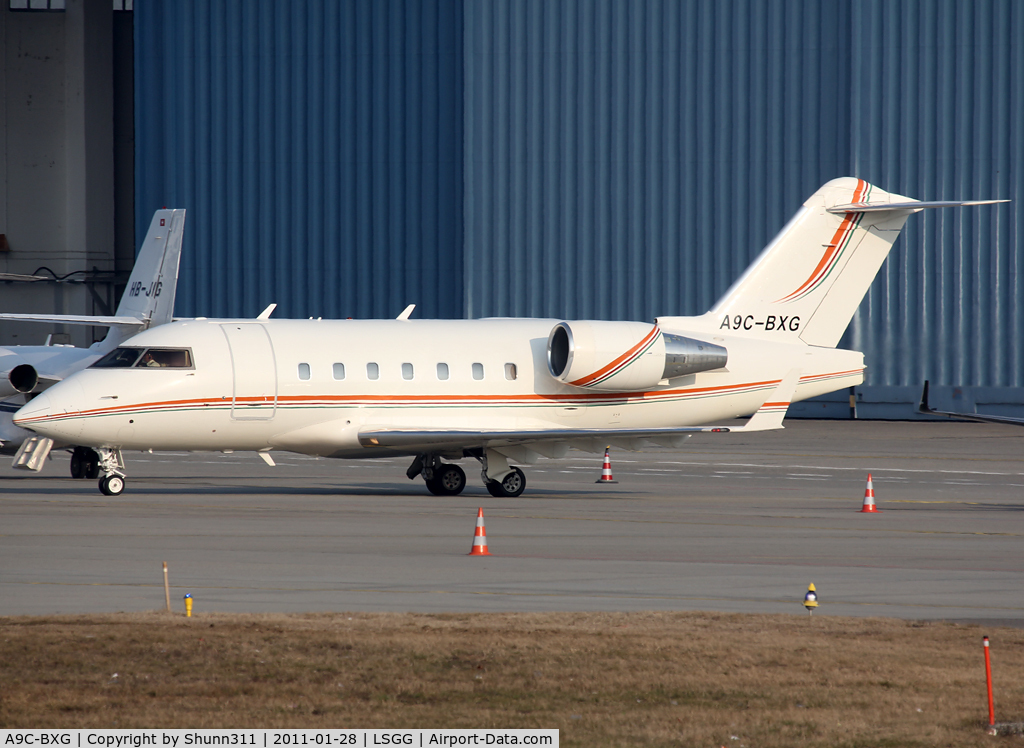 A9C-BXG, 2000 Bombardier Challenger 604 (CL-600-2B16) C/N 5485, Taxiing to the General Aviation area...