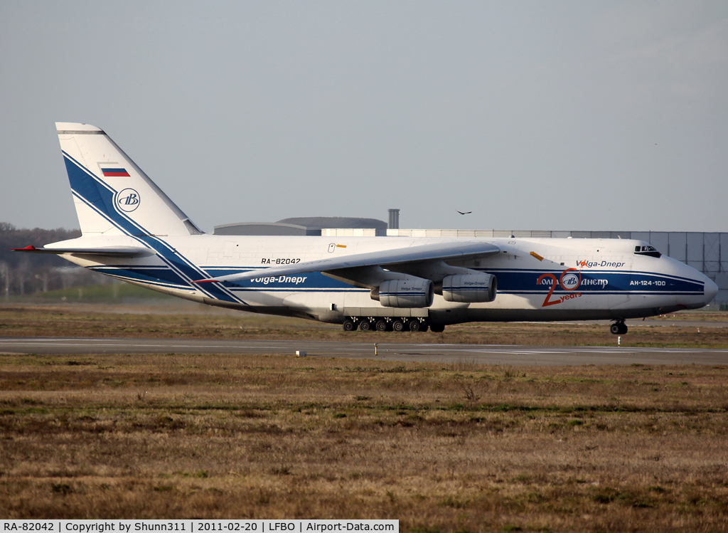 RA-82042, 1991 Antonov An-124-100 Ruslan C/N 9773054055093/0606, Taxiing to the Cargo area... Additional 20th birthday stickers...