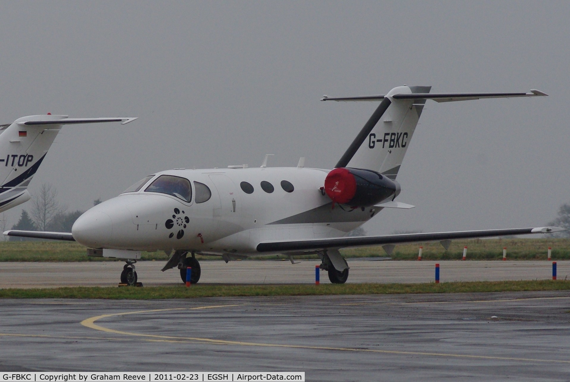 G-FBKC, 2008 Cessna 510 Citation Mustang Citation Mustang C/N 510-0127, Parked at Norwich on a wet afternoon.