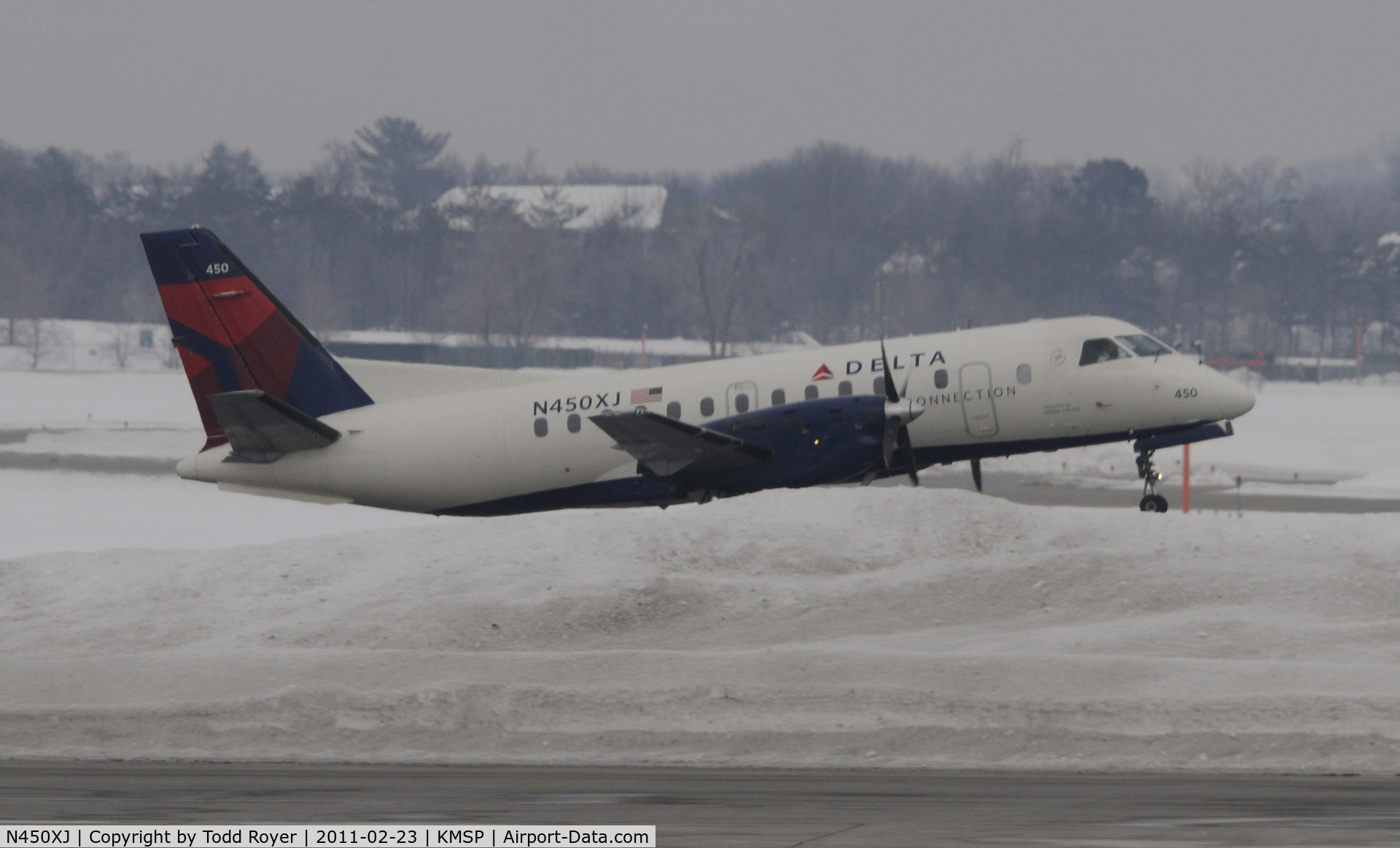 N450XJ, 1998 Saab 340B+ C/N 340B-450, climbing above the snow