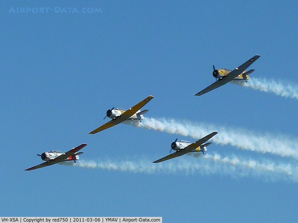 VH-XSA, 1944 North American SNJ-4 Texan C/N 88-09857, Harvard formation team the Southern Knights performing at the Avalon Air Show 2011