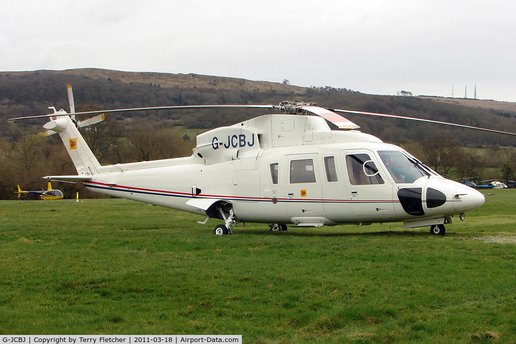 G-JCBJ, 1999 Sikorsky S-76C C/N 760502, A visitor to Cheltenham Racecourse on 2011 Gold Cup Day