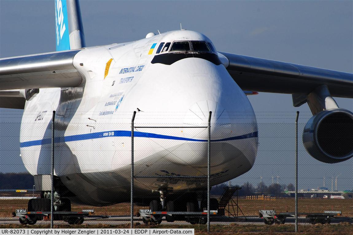 UR-82073, 1994 Antonov An-124-100 Ruslan C/N 9773054359139, That little bird on the fence dreams to become such a big bird one day..........