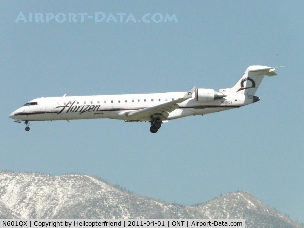 N601QX, 2000 Bombardier CRJ-701 (CL-600-2C10) Regional Jet C/N 10009, On final to runway 26R arriving from Portland, Oregon