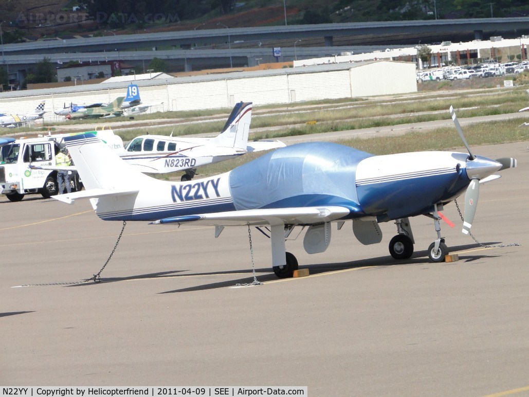 N22YY, 2003 Lancair Legacy C/N L2K-144, Parked and covered up by Admin Bldg