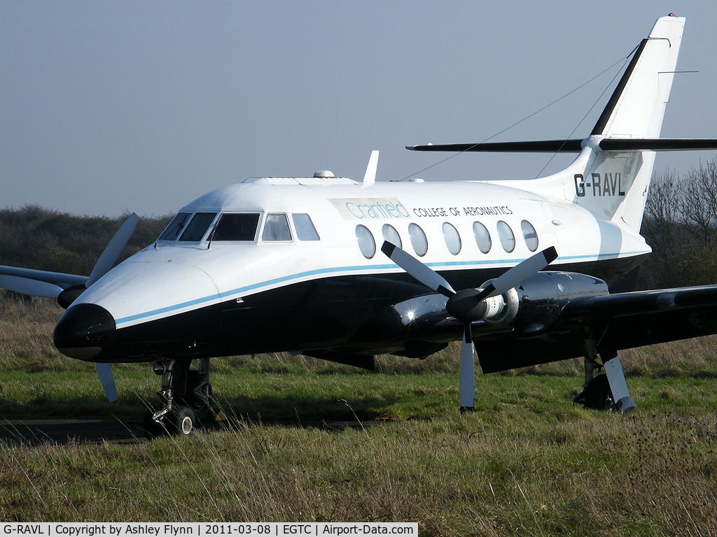 G-RAVL, 1969 Handley Page HP-137 Jetstream 200 C/N 208, Stored at Cranfield on the disused runway.