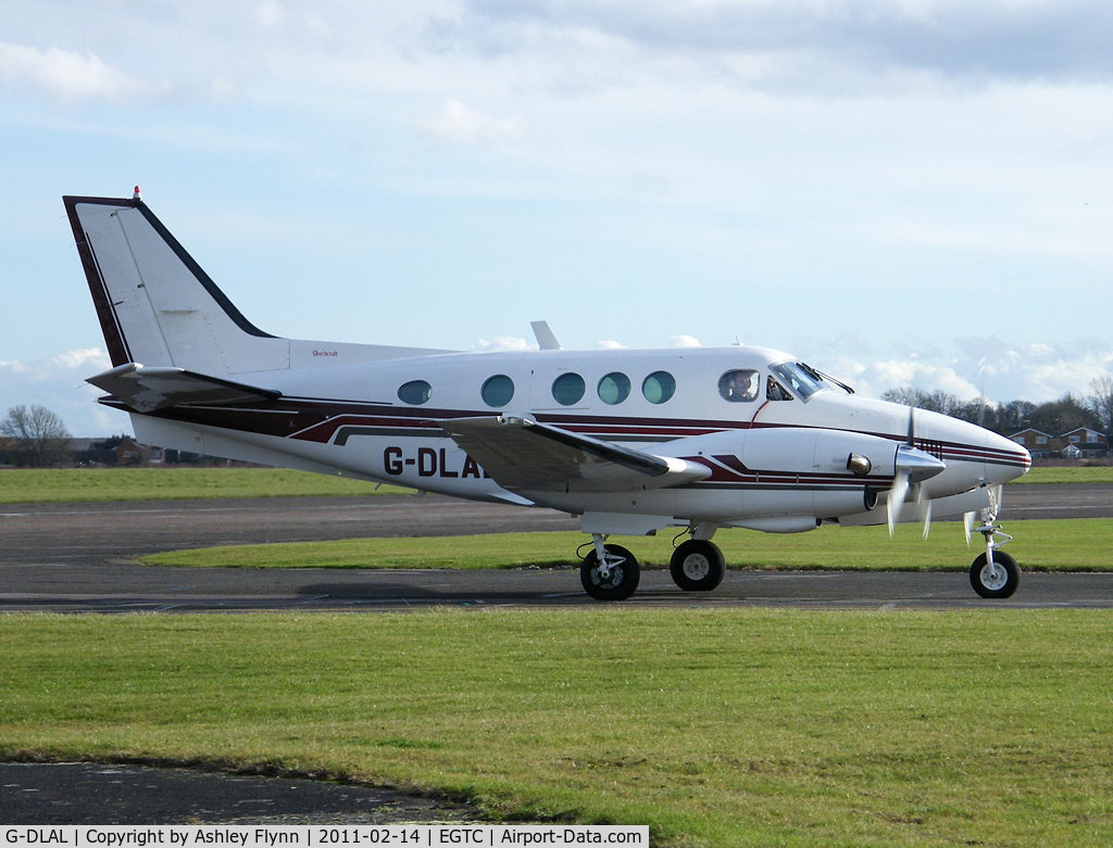 G-DLAL, 1976 Beech E90 King Air C/N LW-187, Taxies back to the hangar after engine runs.