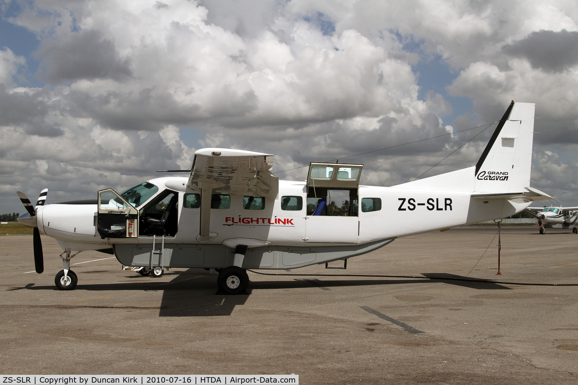 ZS-SLR, 1996 Cessna 208B Grand Caravan C/N 208B0497, Readying for another flight at the Dar Es Salaam commuter terminal