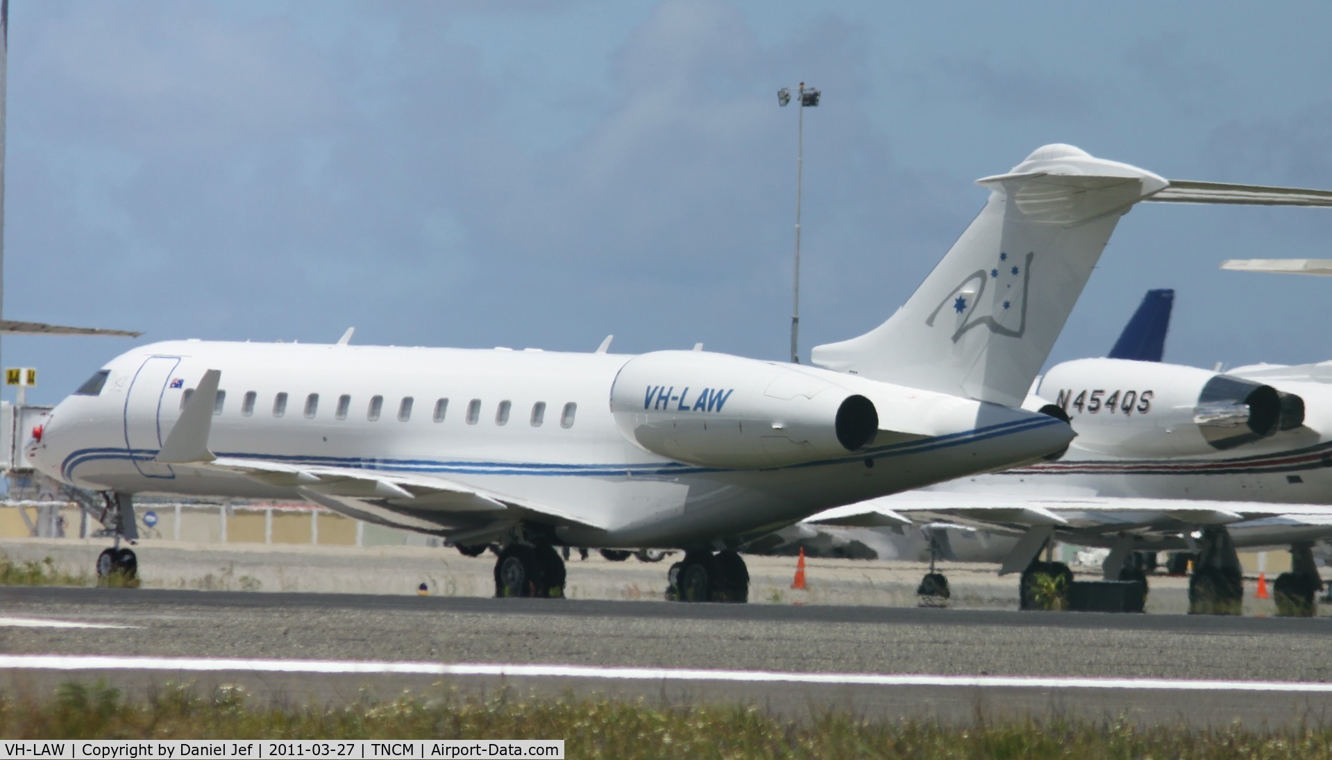 VH-LAW, 2008 Bombardier BD-700-1A10 Global Express XRS C/N 9299, Global VH-LAW park at the blast wall at TNCM