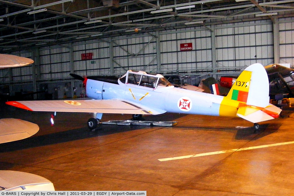 G-BARS, 1952 De Havilland DHC-1 Chipmunk T.10 C/N C1/0557, inside the 727 NAS Hangar. In Portugese Air Force colours and wearing the serial 1377