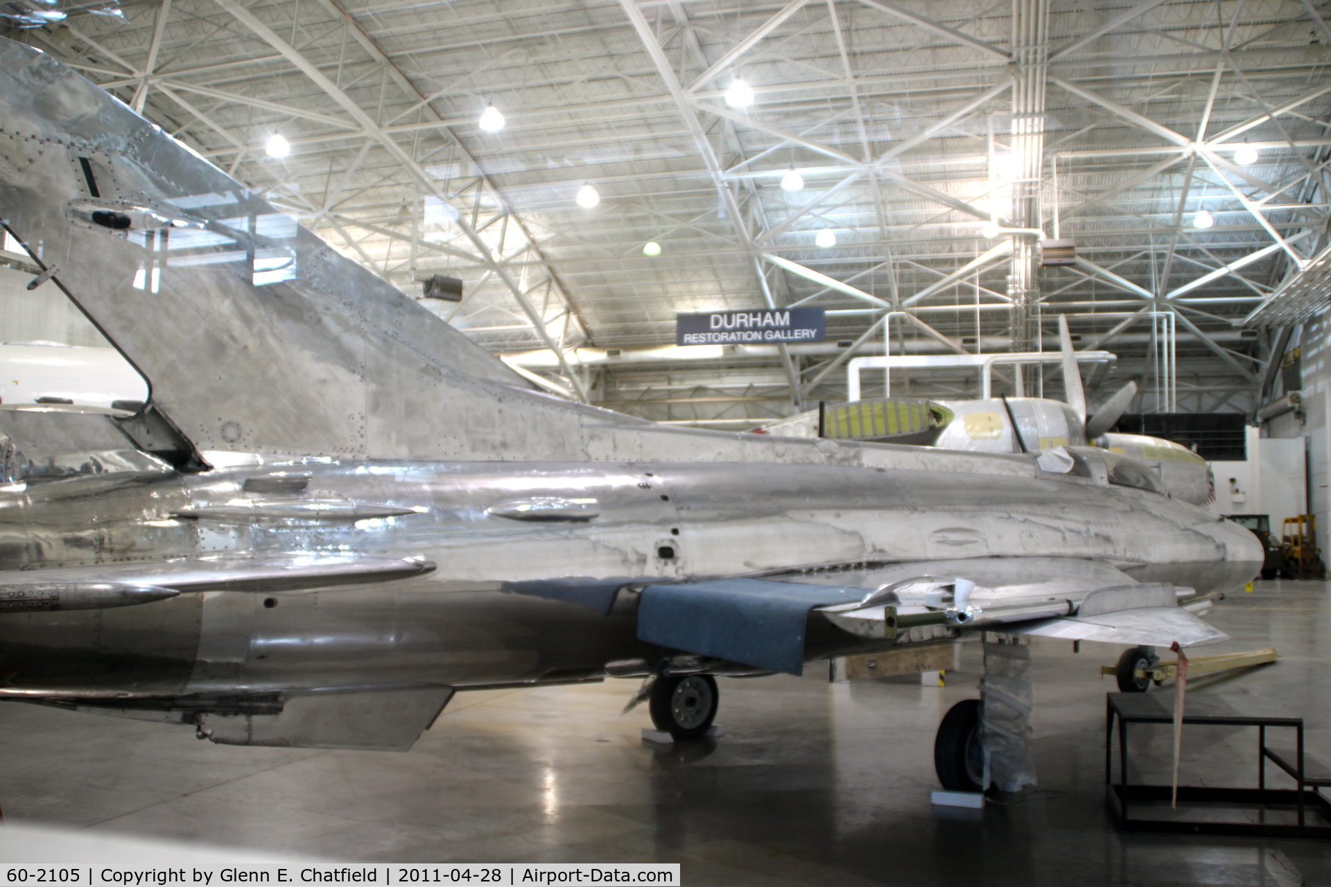 60-2105, Mikoyan-Gurevich MiG-21F-13 C/N Not found 21067, In the restoration shop at the Strategic Air & Space Museum, Ashland, NE.  Seen from cafe window