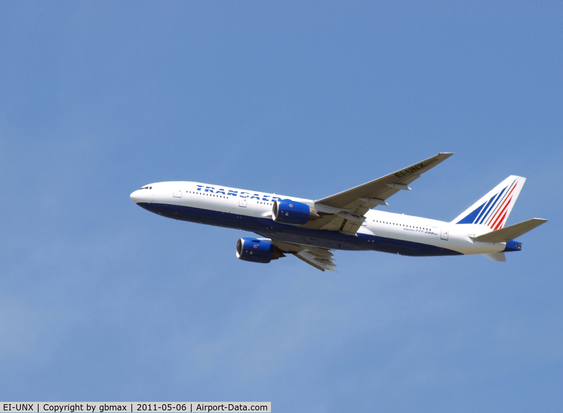 EI-UNX, 1999 Boeing 777-222/ER C/N 30213, Flying over Mineola, NY, going to a landing at JFK