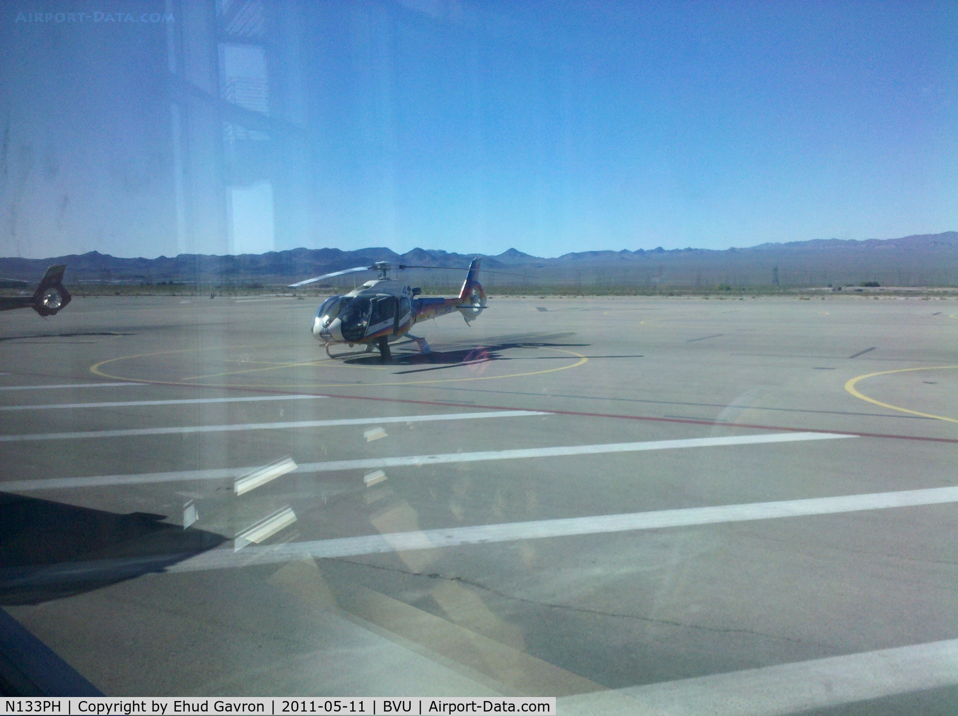 N133PH, Eurocopter EC-130B-4 (AS-350B-4) C/N 3939, Papillon Helicopter parked awaiting tourists going to view the Las Vegas area.