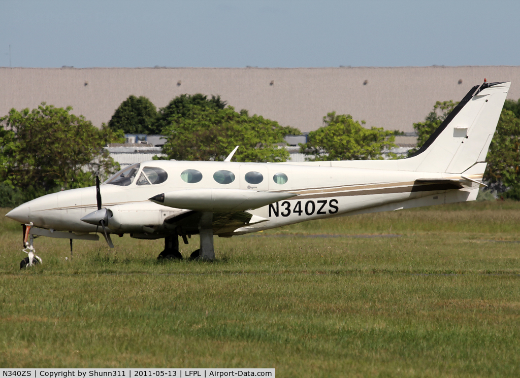 N340ZS, 1980 Cessna 340A C/N 340A0944, Parked on the grass...