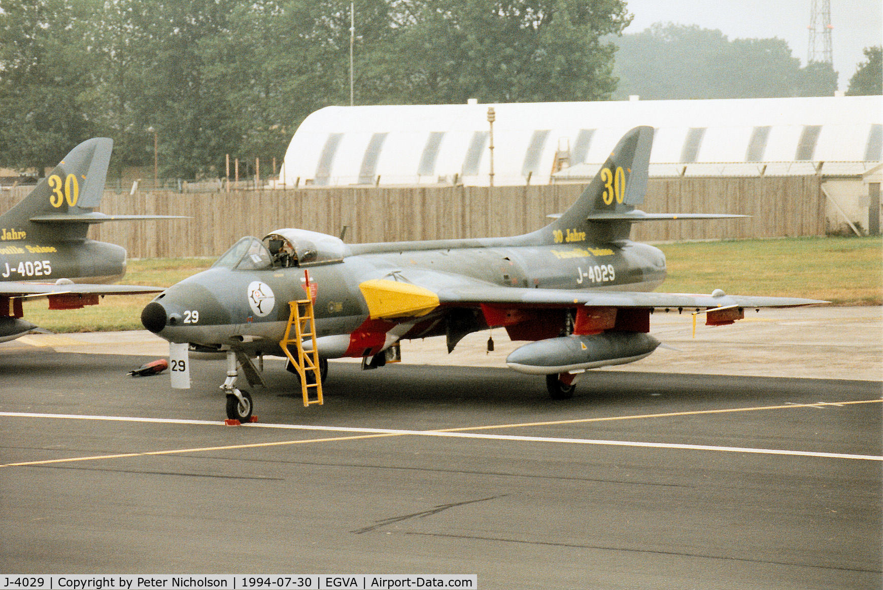 J-4029, Hawker Hunter F.58 C/N 41H-697396, Hunter F.58 of the Patrouille Suisse aerobatic display team in 30 years anniverary markings on the flight-line at the 1994 Intnl Air Tattoo at RAF Fairford.