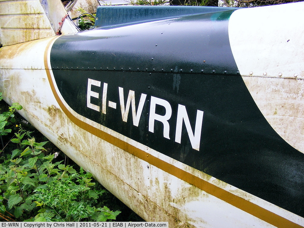 EI-WRN, 1976 Piper PA-28-151 C/N 28-7615212, in the bone yard behind the hangars at Abbeyshrule
