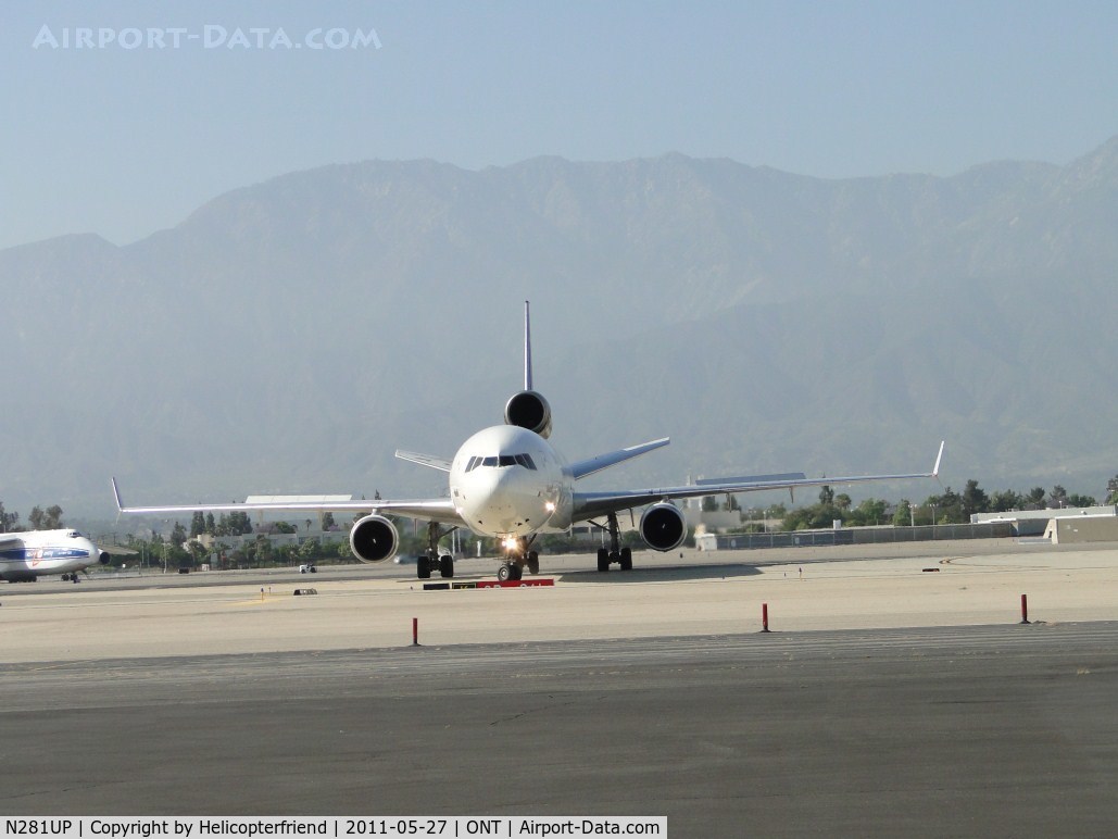 N281UP, 1993 McDonnell Douglas MD-11F C/N 48538, Turning onto taxiway Sierra for trip back to UPS area