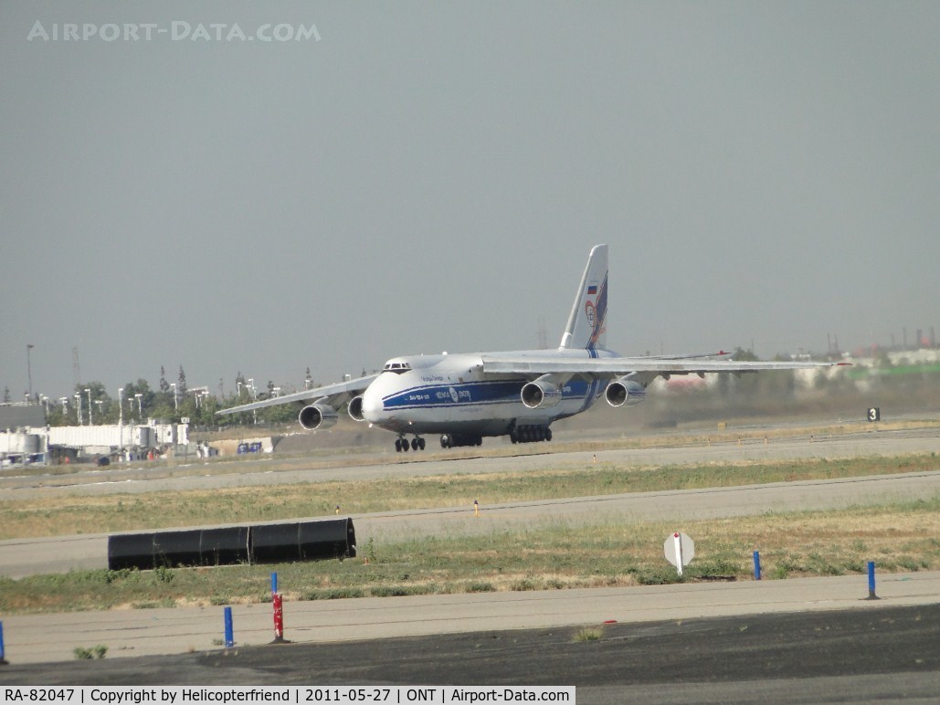 RA-82047, 1992 Antonov An-124-100 Ruslan C/N 9773053259121/0701, Rolling for take off on runway 26R
