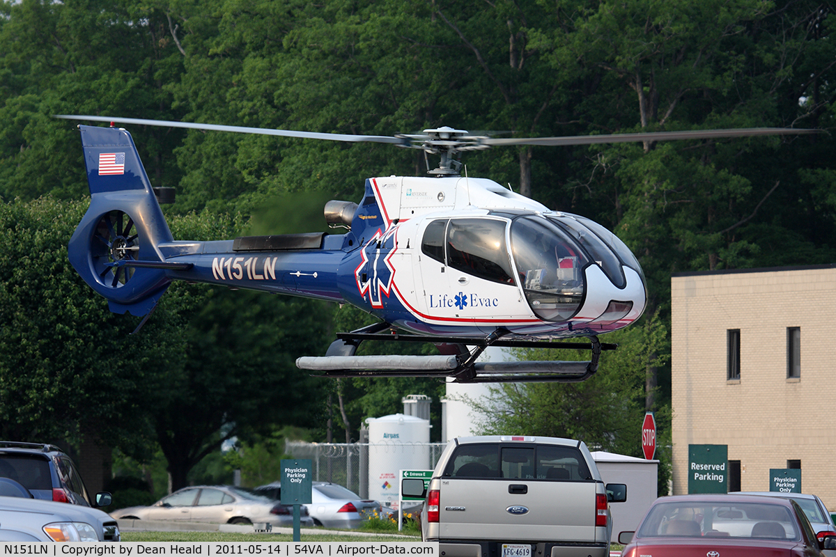 N151LN, 2006 Eurocopter EC-130B-4 (AS-350B-4) C/N 4114, Life Evac's 2006 Eurocopter EC130-B4 N151LN departing the heliport behind the Riverside Regional Medical Center in Newport News, VA (54VA).