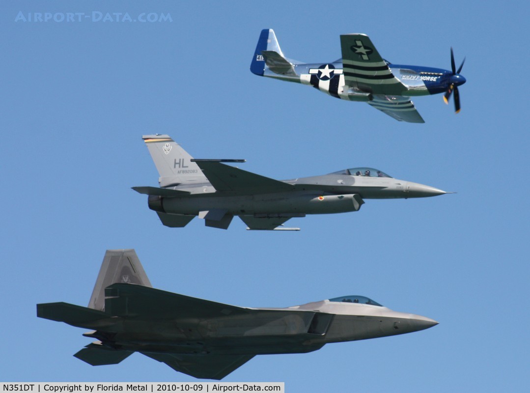 N351DT, 1944 North American P-51D Mustang C/N 122-41042, Crazy Horse 2 with F-16 and F-22 over Daytona Beach