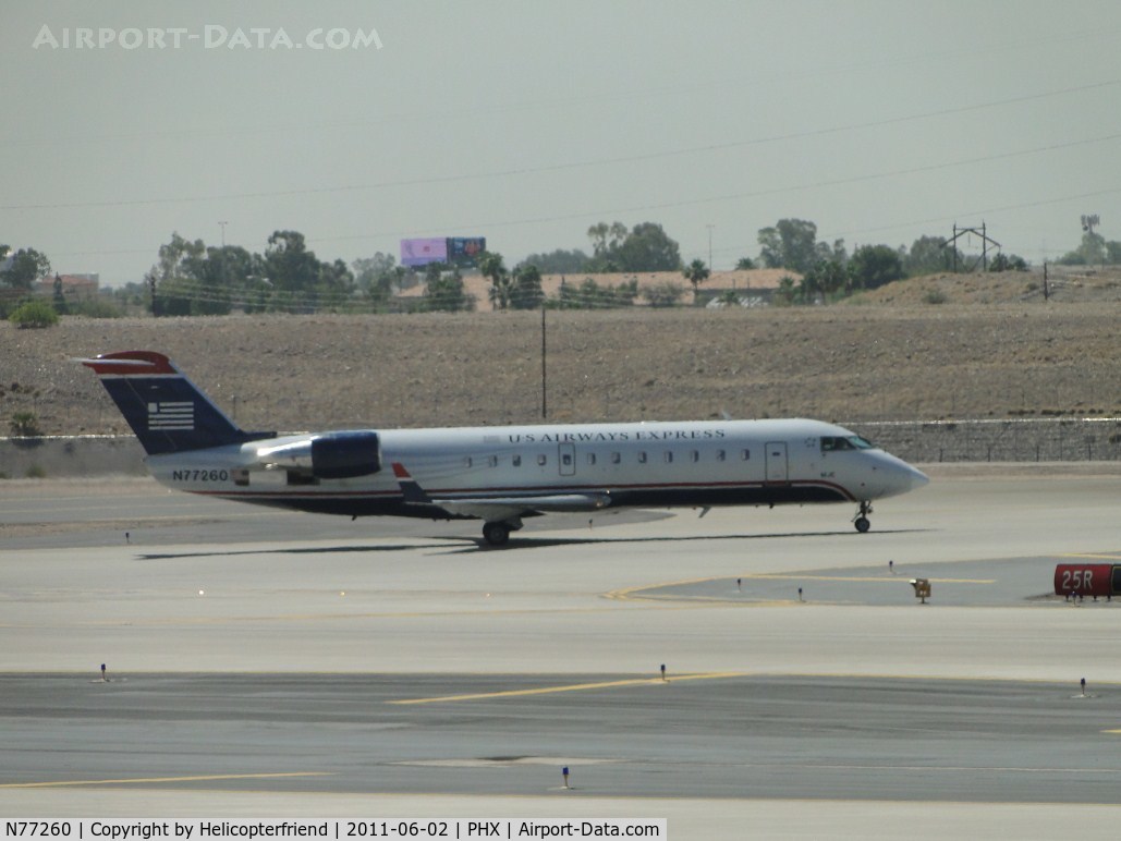 N77260, 1998 Bombardier CRJ-200LR (CL-600-2B19) C/N 7260, Taxiing for take off at runway 25R