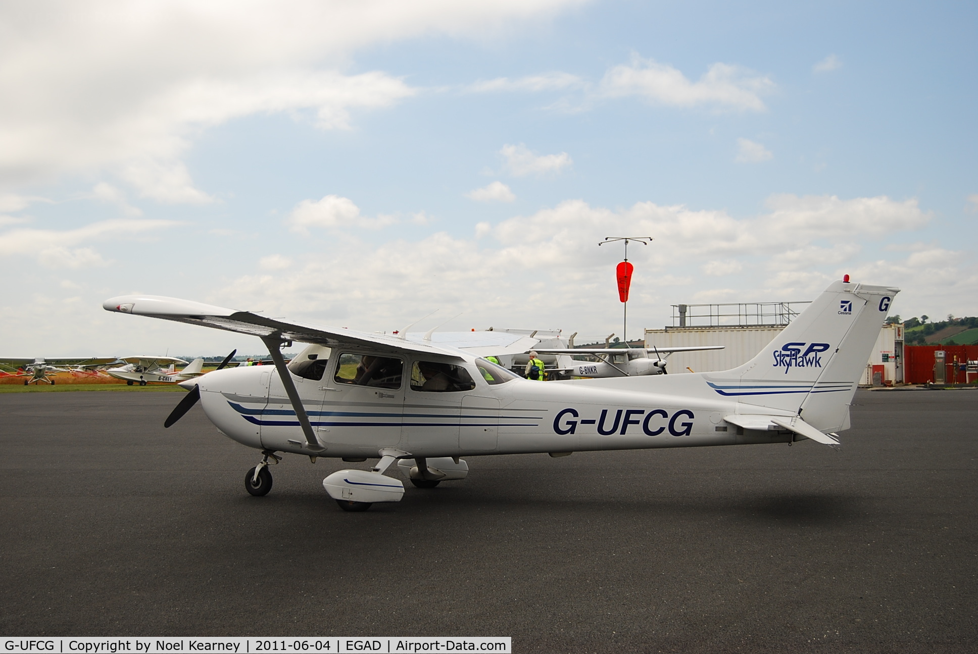 G-UFCG, 2003 Cessna 172S C/N 172S9450, Parked on the apron at Newtownards Airfield.