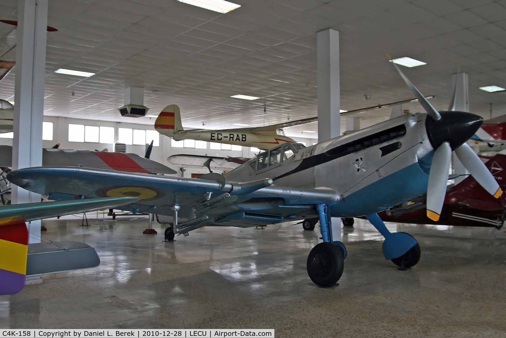 C4K-158, Hispano HA-1112-M1L Buchon C/N 211, Colorful Spanish-built Me-109, powered by a British Rolls-Royce Merlin.