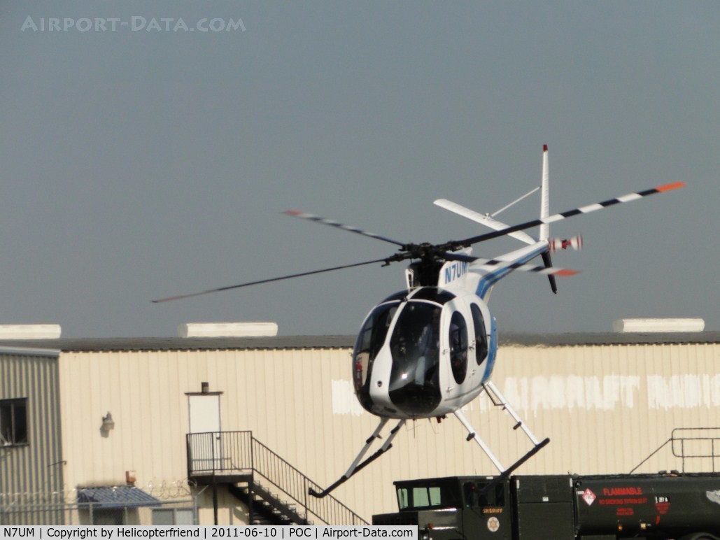 N7UM, 1975 Hughes 369HS C/N 850767S, Lifting of from helipads at LA County parking area and preparing to head westbound