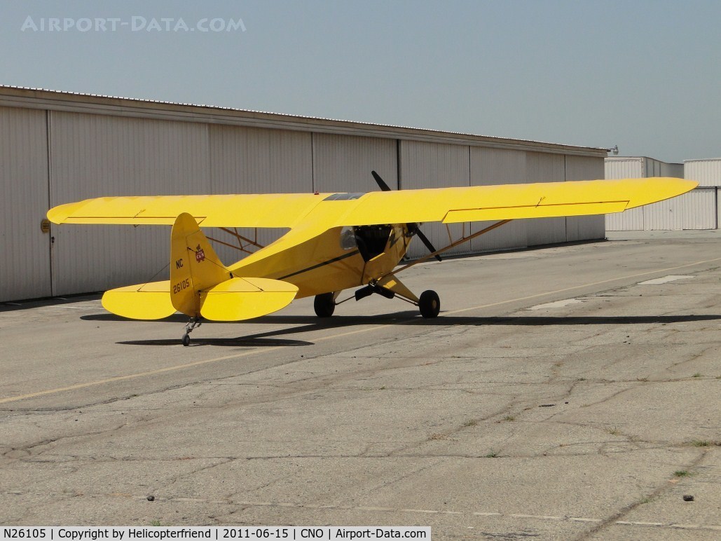 N26105, Piper J3C-65 Cub Cub C/N 4051, Parked by the hanger