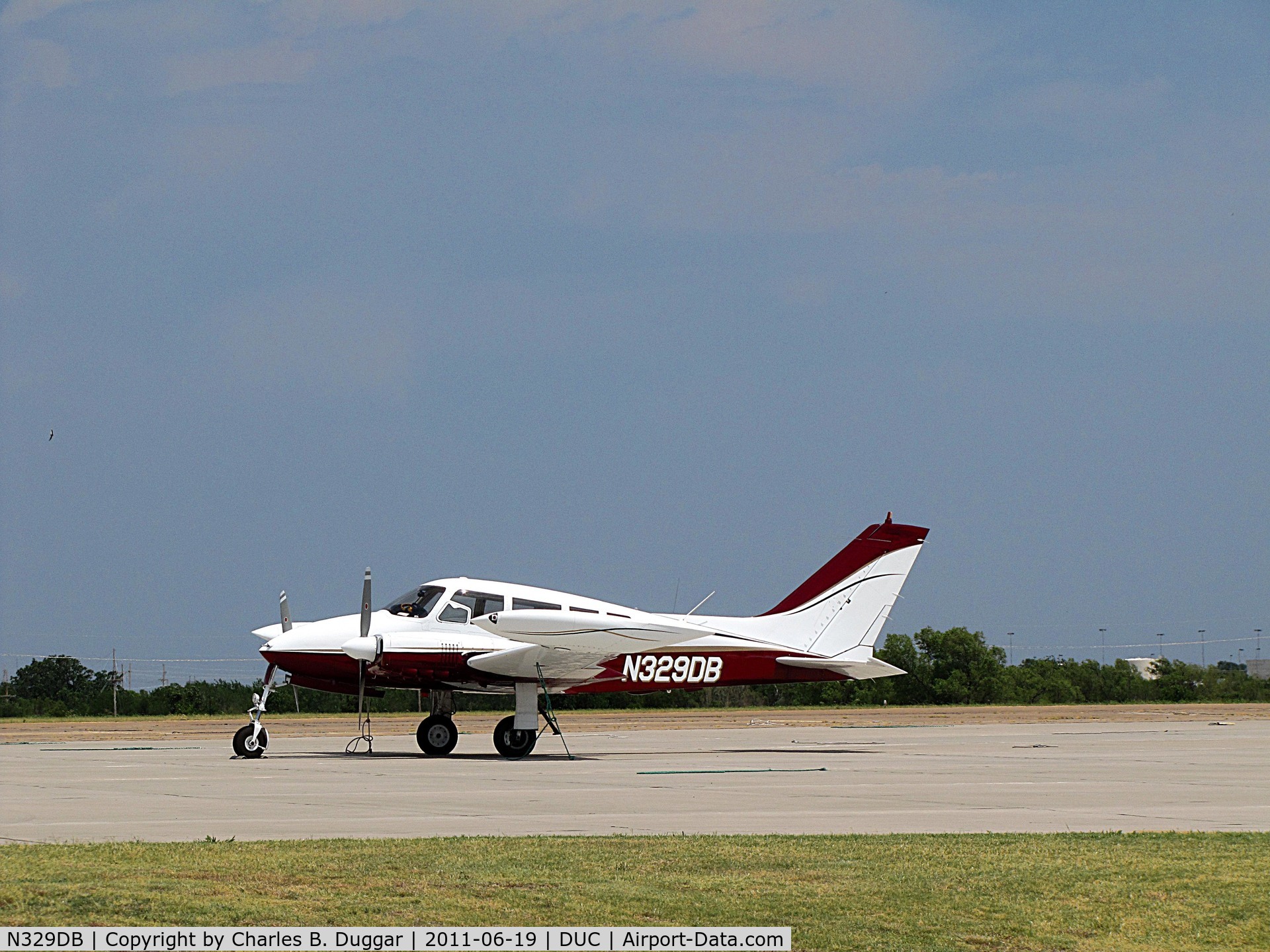 N329DB, 1964 Cessna 320B Skyknight C/N 320B0015, Hot day at Halliburton Field in Duncan, OK.