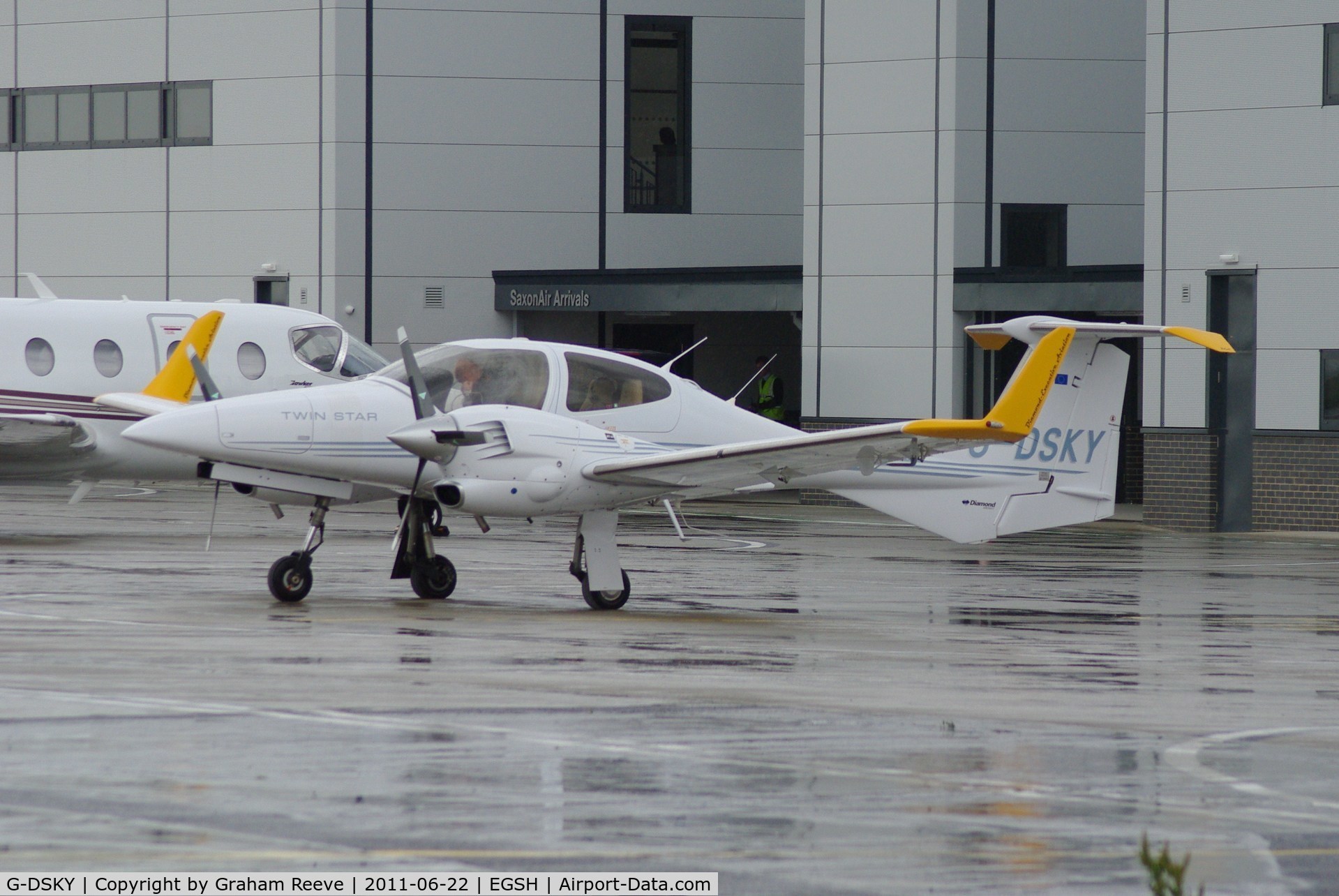 G-DSKY, 2005 Diamond DA-42 Twin Star C/N 42.084, Parked on a wet afternoon.