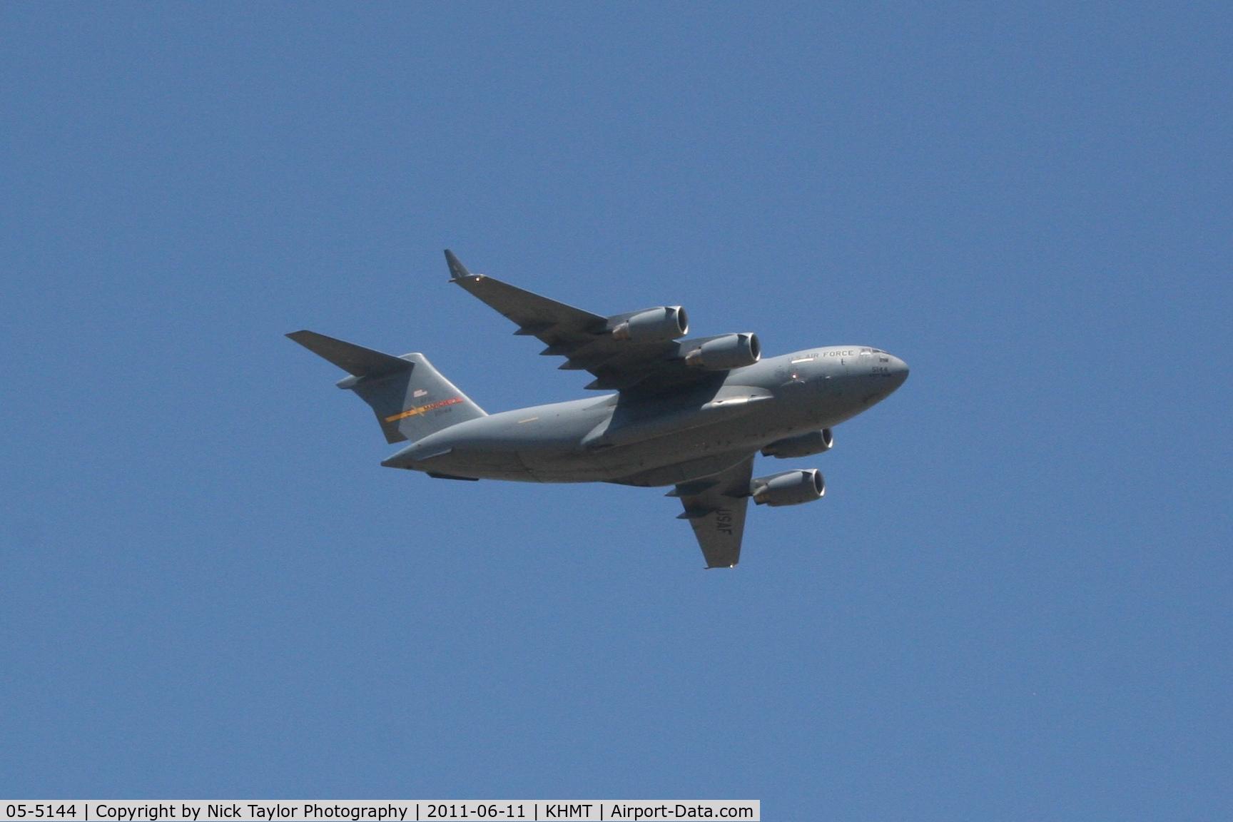 05-5144, 2005 Boeing C-17A Globemaster III C/N P-144, C-17 from March AFB passes through Hemet during the airshow
