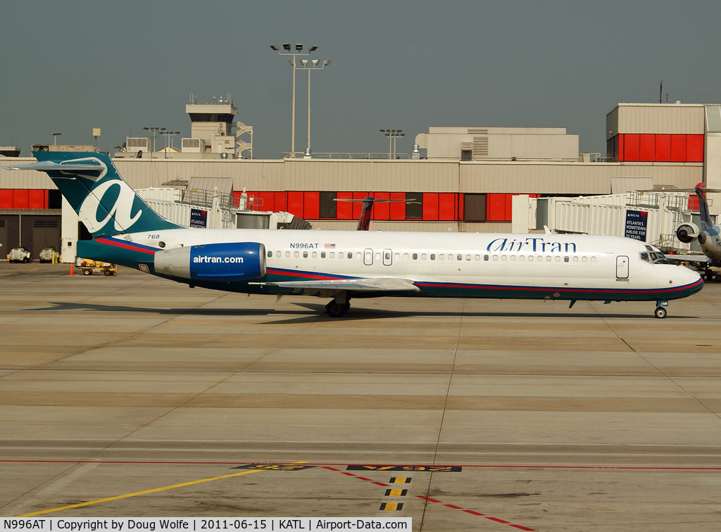 N996AT, 2002 Boeing 717-200 C/N 55140, Pulling away from gates at Atlanta.