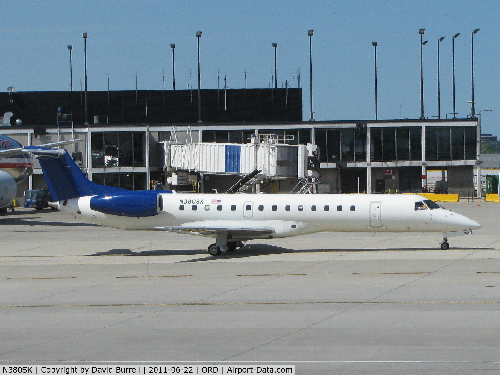 N380SK, 2002 Embraer ERJ-140LR (EMB-135KL) C/N 145613, Chautauqua Airlines Inc Embraer EMB-135KL taxiing at Chicago O'hare Airport.