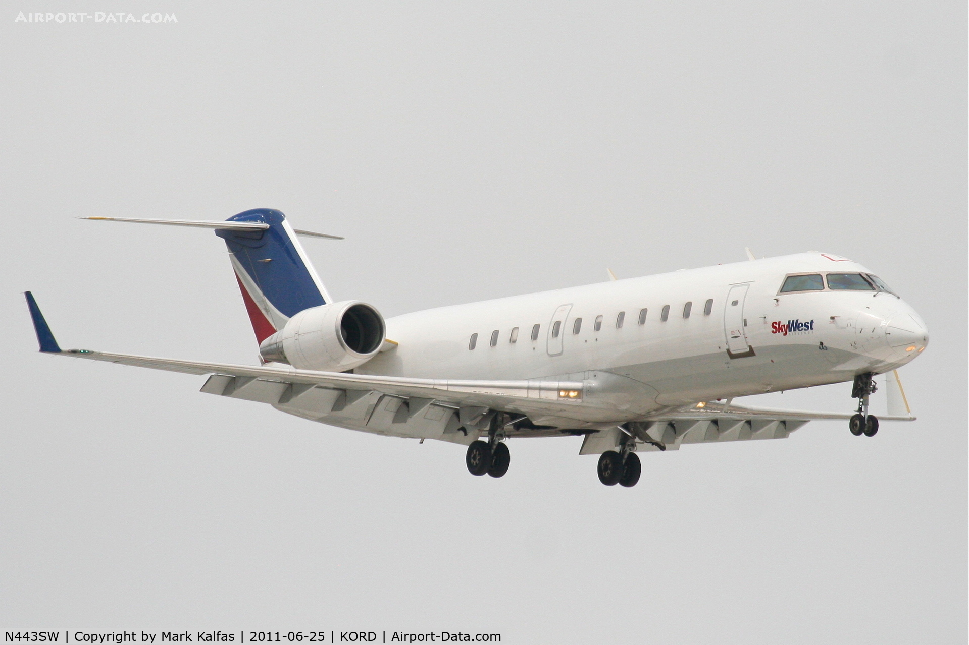 N443SW, 2002 Bombardier CRJ-200LR (CL-600-2B19) C/N 7638, SkyWest Bombardier CL-600-2B19, SKW6375, arriving from KCMX, RWY 14R approach KORD.