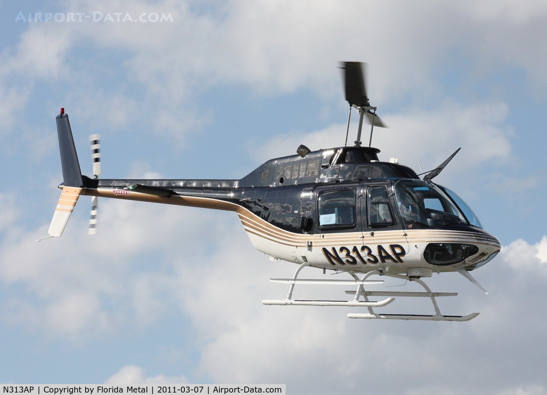 N313AP, 1981 Bell 206B JetRanger C/N 3471, Bell 206B leaving Heliexpo Orlando