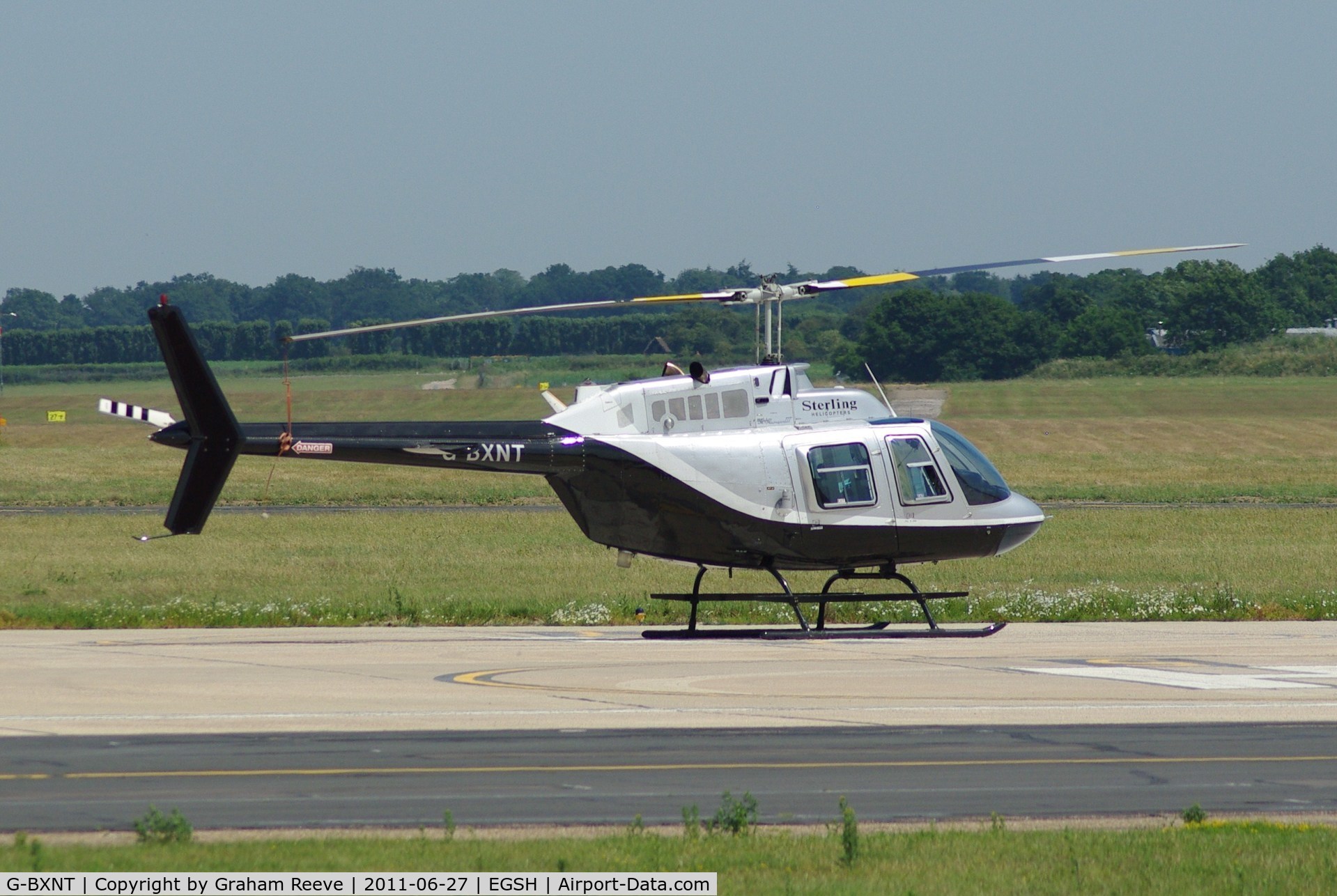 G-BXNT, 1977 Bell 206B JetRanger III C/N 2398, Parked at Norwich.