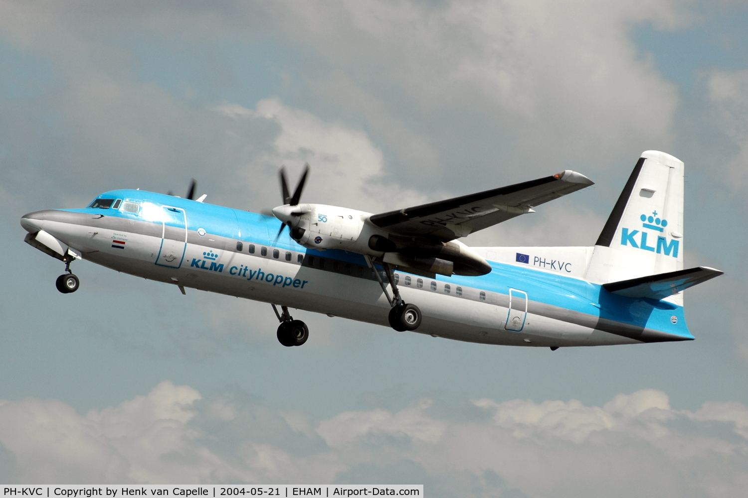 PH-KVC, 1990 Fokker 50 C/N 20191, KLM Fokker 50 retracting its landing gear after take off from Schiphol airport.