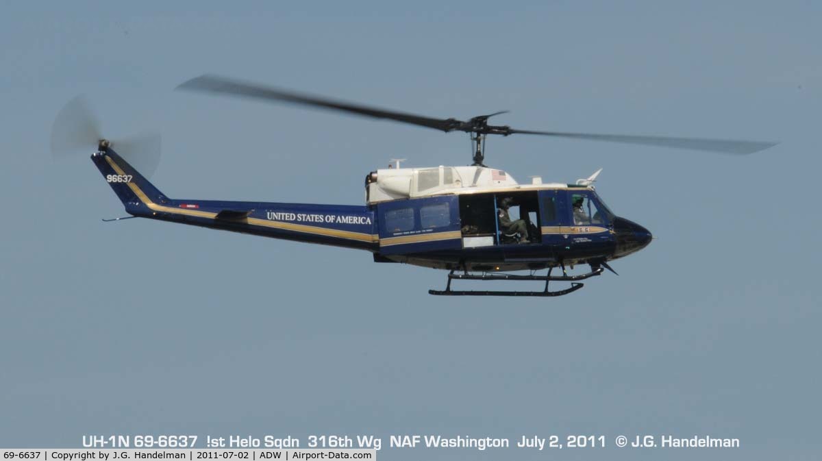 69-6637, Bell UH-1N Iroquois C/N 31043, over NAF Washington flight line