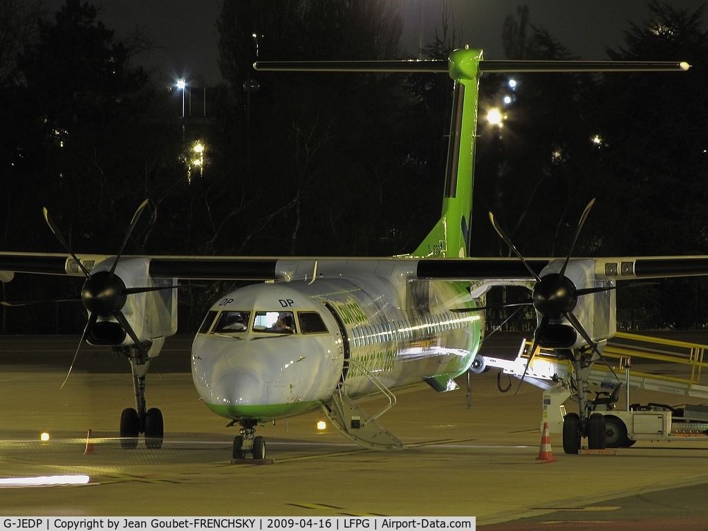 G-JEDP, 2003 De Havilland Canada DHC-8-402Q Dash 8 C/N 4085, at T1 by night