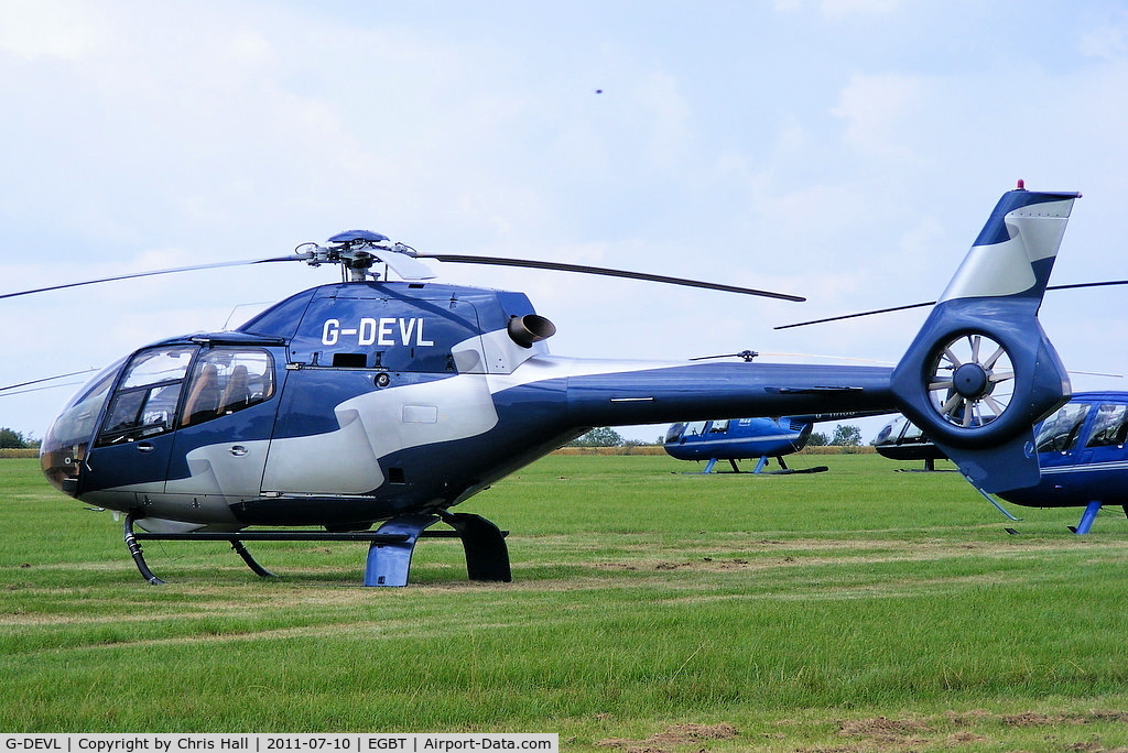 G-DEVL, 2001 Eurocopter EC-120B Colibri C/N 1273, being used for ferrying race fans to the British F1 Grand Prix at Silverstone