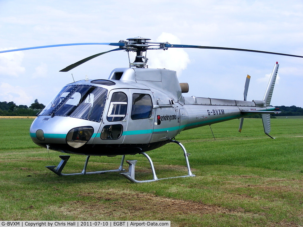 G-BVXM, 1987 Aerospatiale AS-350B Ecureuil C/N 2013, being used for ferrying race fans to the British F1 Grand Prix at Silverstone