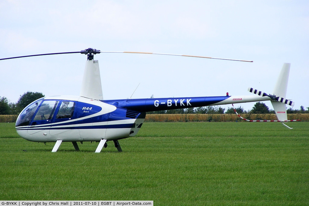 G-BYKK, 1999 Robinson R44 Astro C/N 0572, being used for ferrying race fans to the British F1 Grand Prix at Silverstone