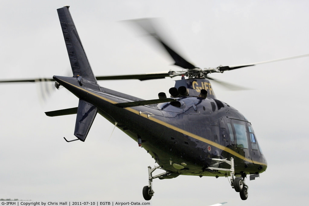 G-IFRH, 1990 Agusta A-109C C/N 7619, being used for ferrying race fans to the British F1 Grand Prix at Silverstone