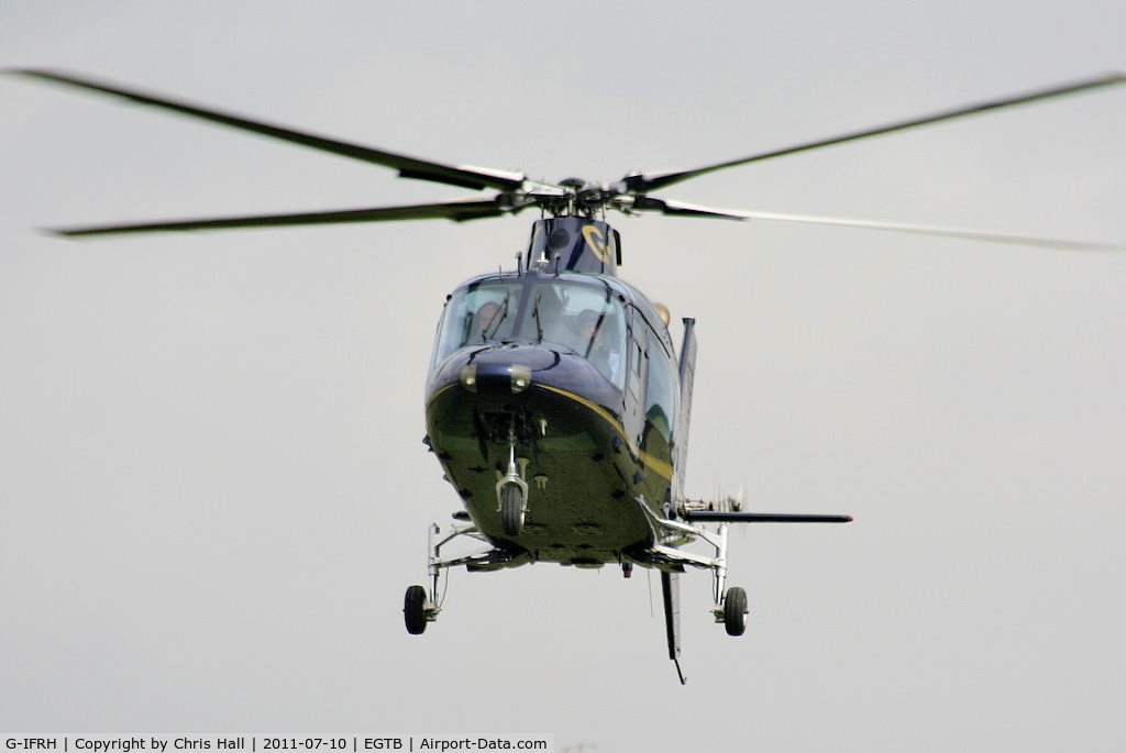 G-IFRH, 1990 Agusta A-109C C/N 7619, being used for ferrying race fans to the British F1 Grand Prix at Silverstone