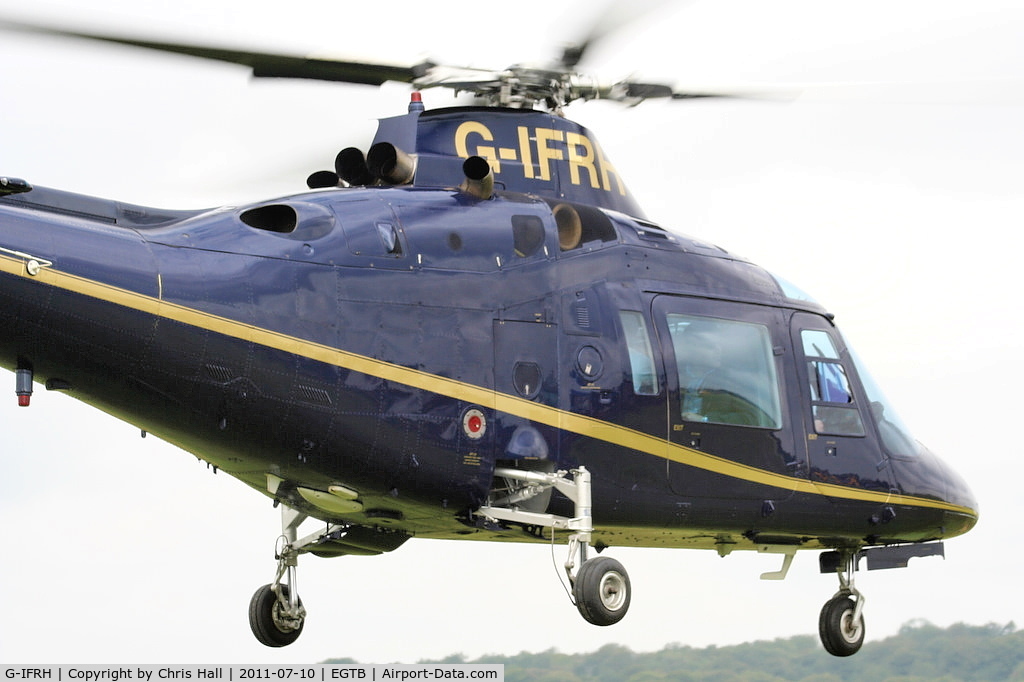 G-IFRH, 1990 Agusta A-109C C/N 7619, being used for ferrying race fans to the British F1 Grand Prix at Silverstone
