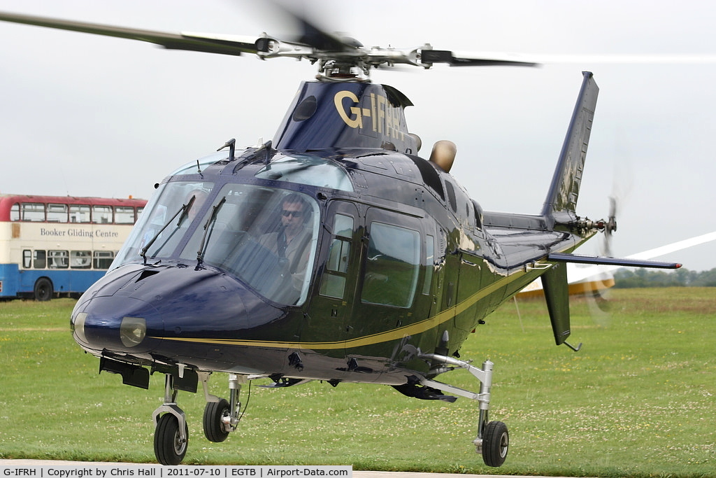 G-IFRH, 1990 Agusta A-109C C/N 7619, being used for ferrying race fans to the British F1 Grand Prix at Silverstone