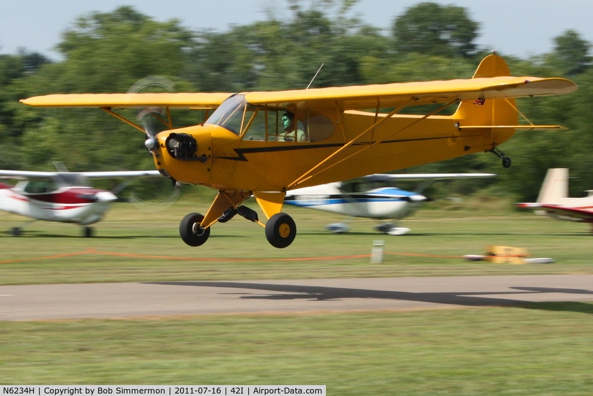 N6234H, 1946 Piper J3C-65 Cub C/N 19408, Another low pass during the EAA fly-in at Zanesville, Ohio