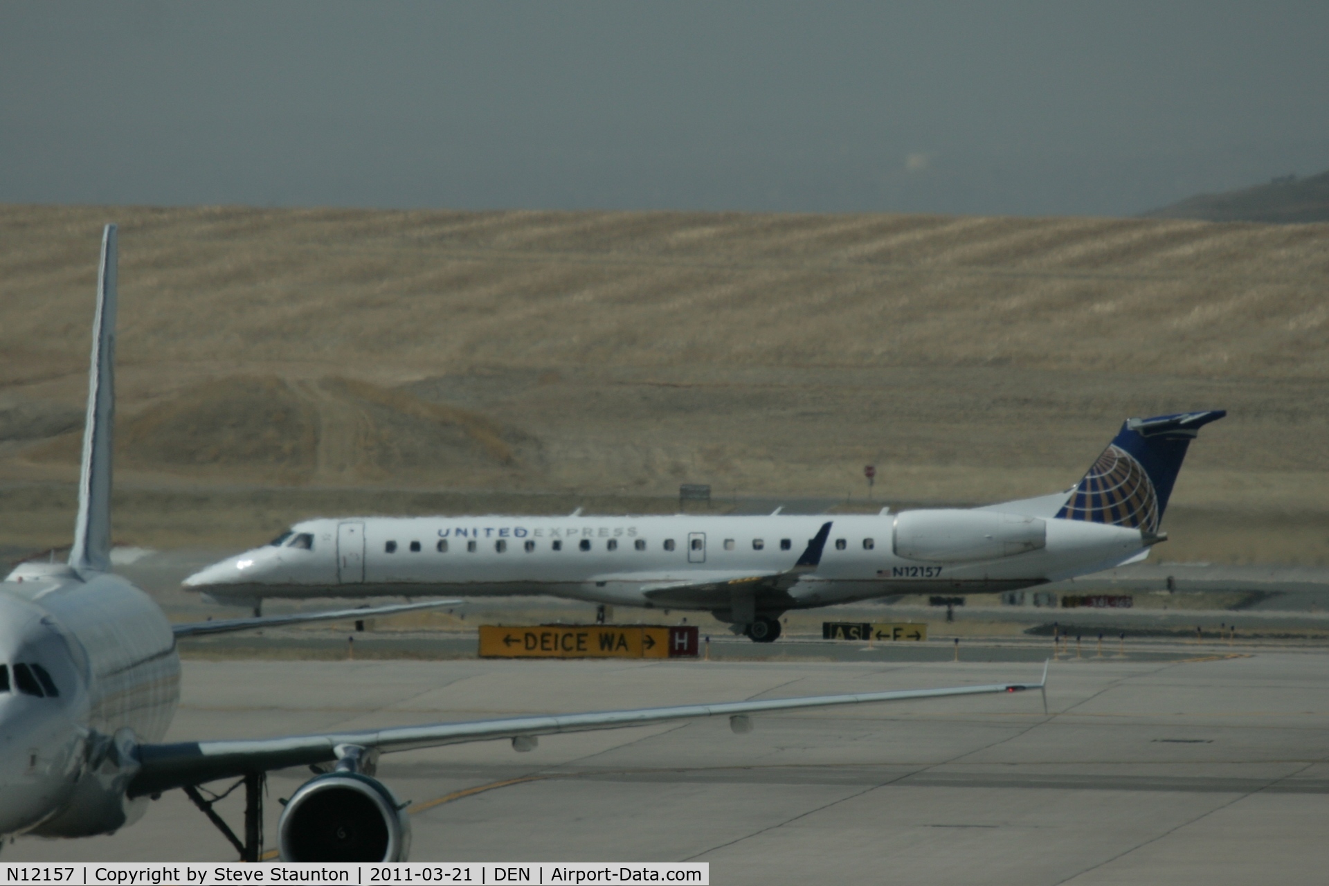 N12157, 2004 Embraer ERJ-145XR (EMB-145XR) C/N 145787, Taken at Denver International Airport, in March 2011 whilst on an Aeroprint Aviation tour