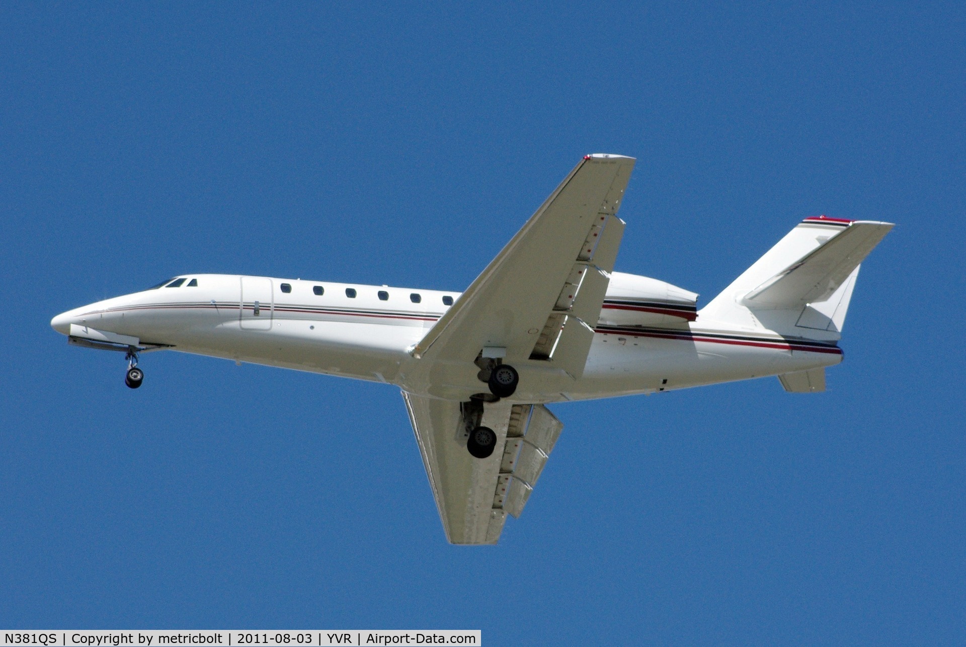 N381QS, 2006 Cessna 680 Citation Sovereign C/N 680-0097, Landing on a bright, sunny day .